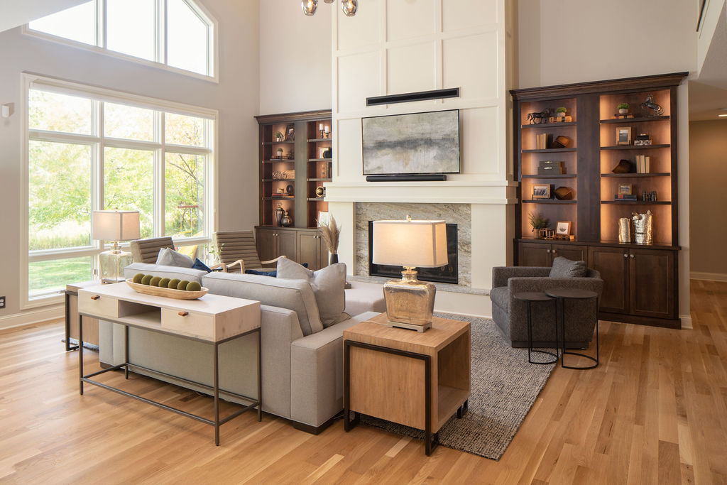 An Edina remodel with a living room featuring hardwood floors and a fireplace.