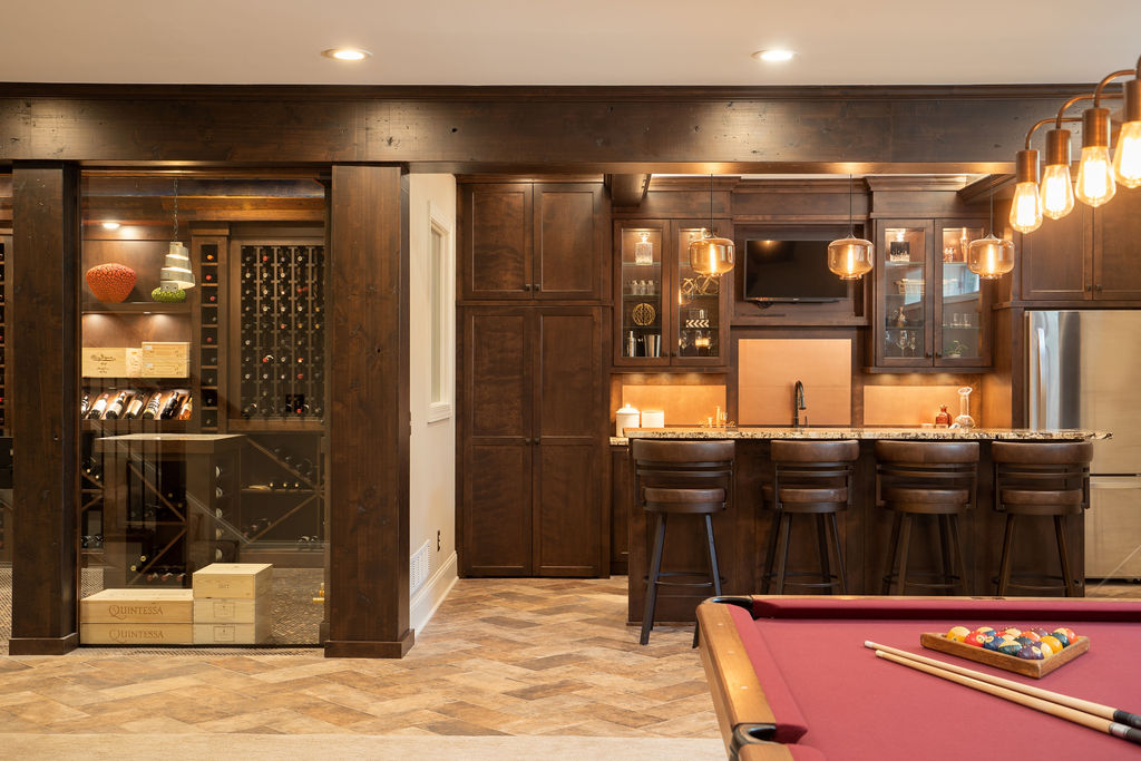 Edina remodel: A basement with a pool table and bar has been transformed in this project.
