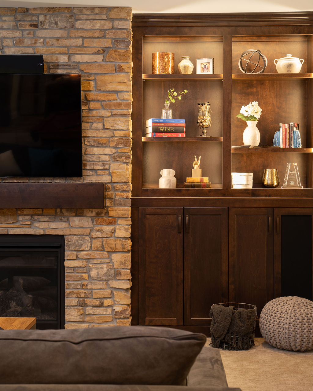 A stone fireplace in an Edina remodel living room.
