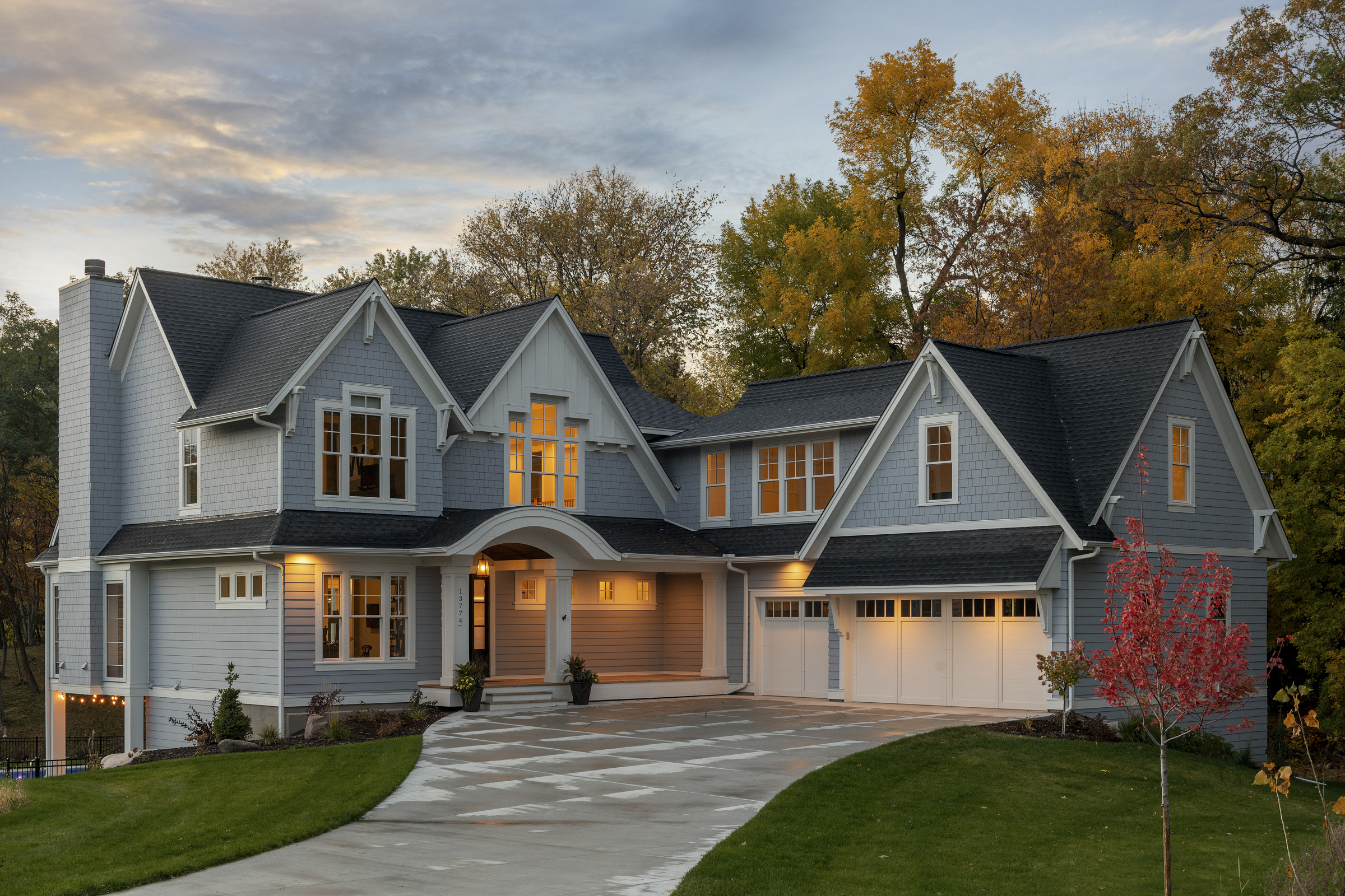 Discover home exterior design ideas featuring a garage and driveway.