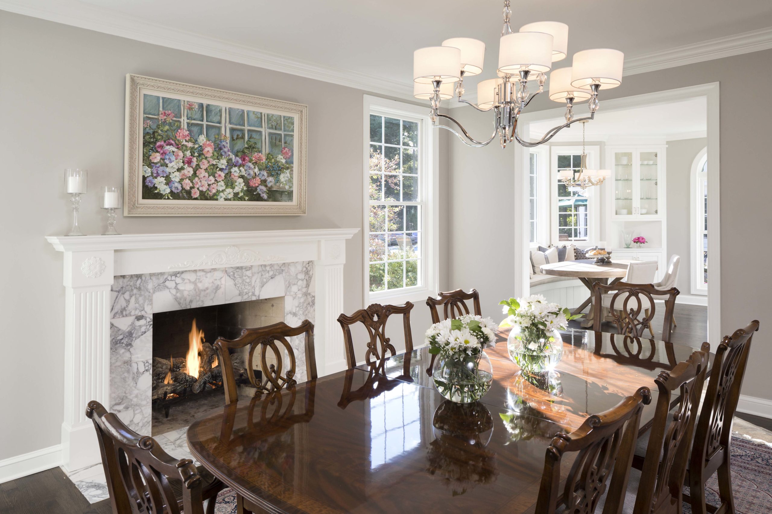A dining room with a fireplace.