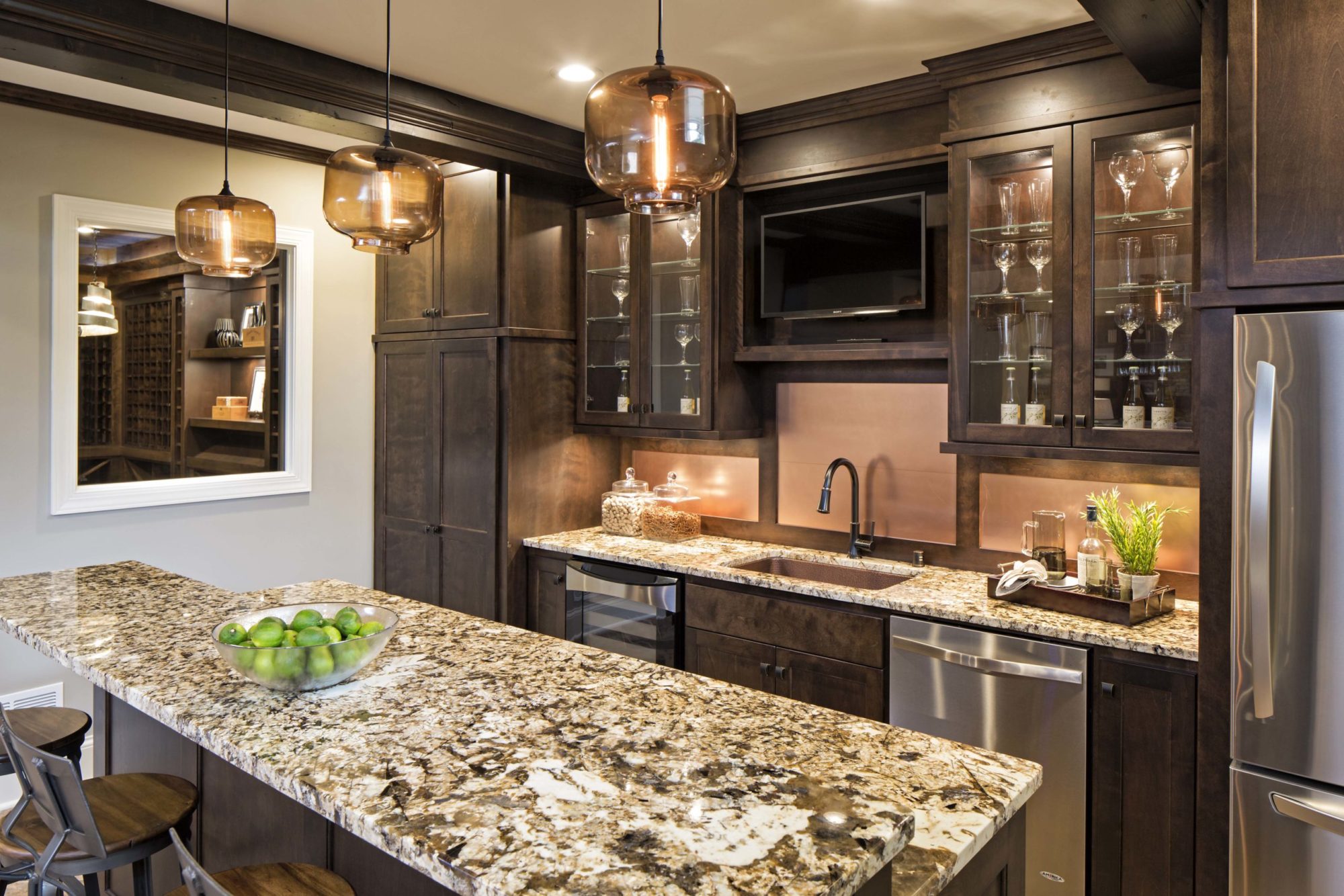 An Edina kitchen remodel with granite counter tops and stainless steel appliances.