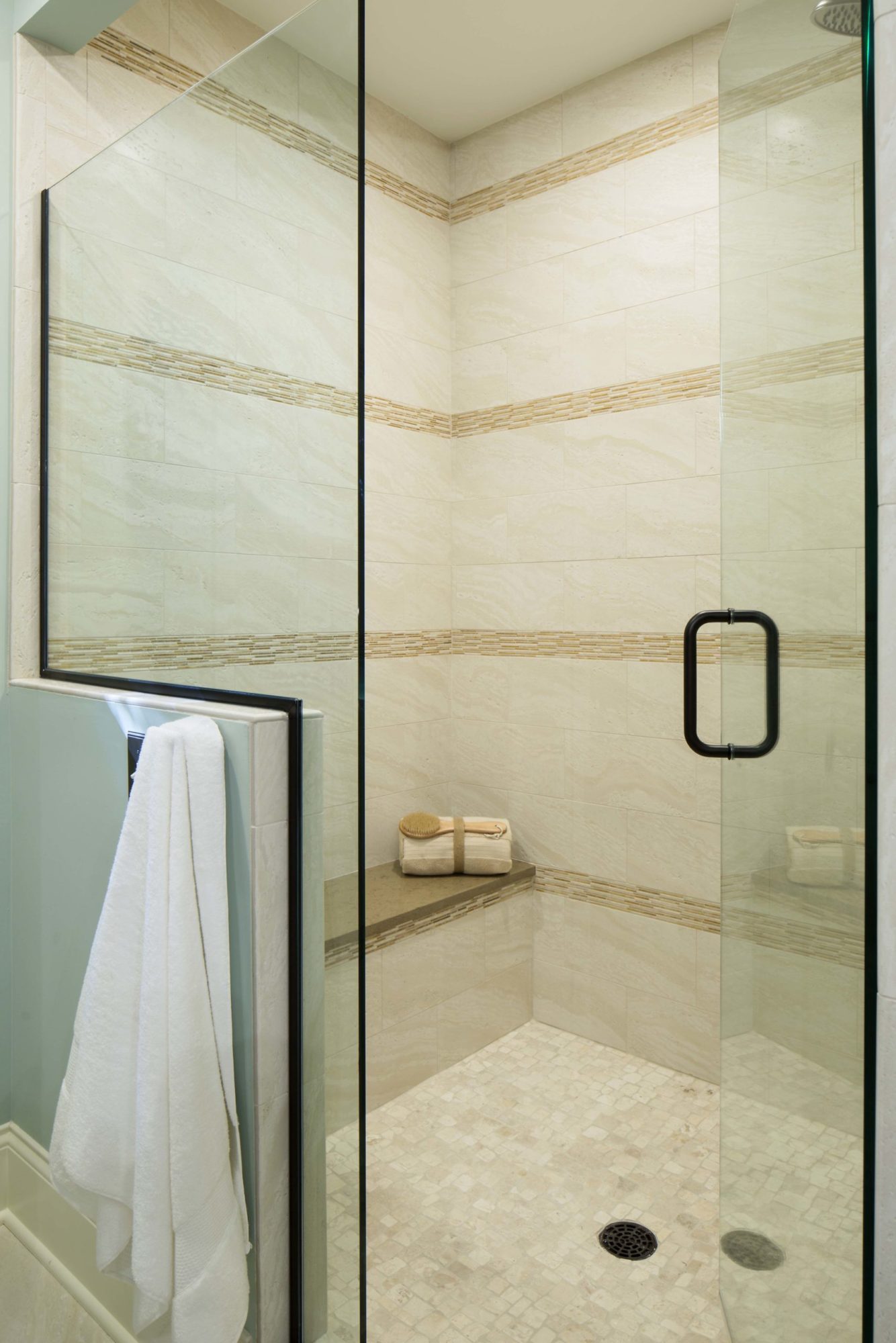 An Edina remodel with a glass shower door.