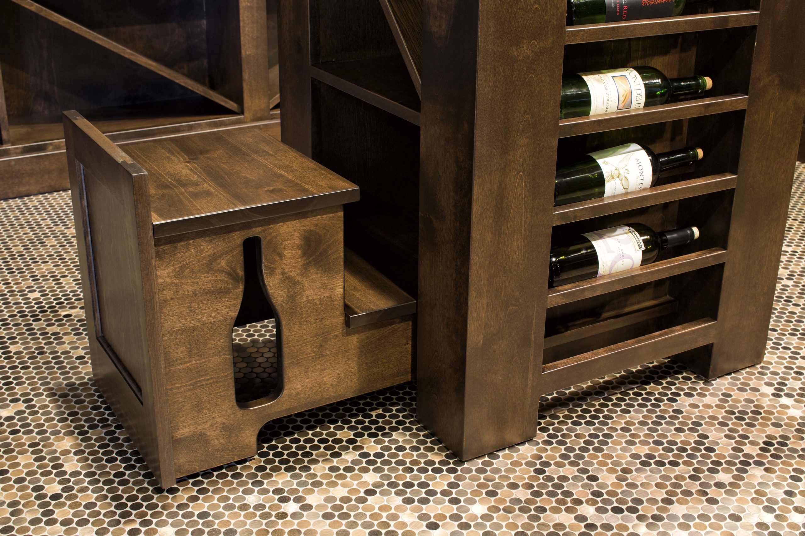 Wooden wine rack featuring bottles, perfect for an Edina remodel.
