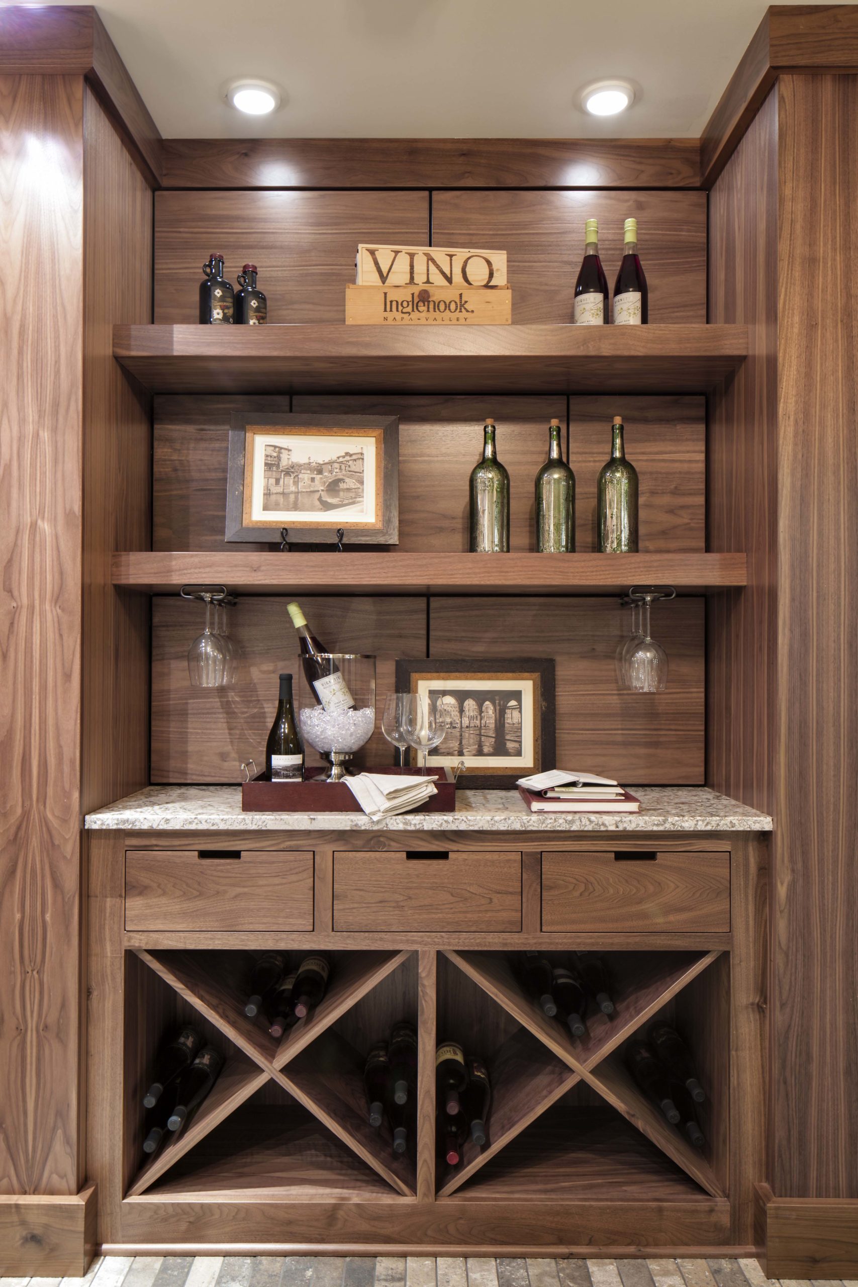 A wine cellar with shelves and wine bottles.