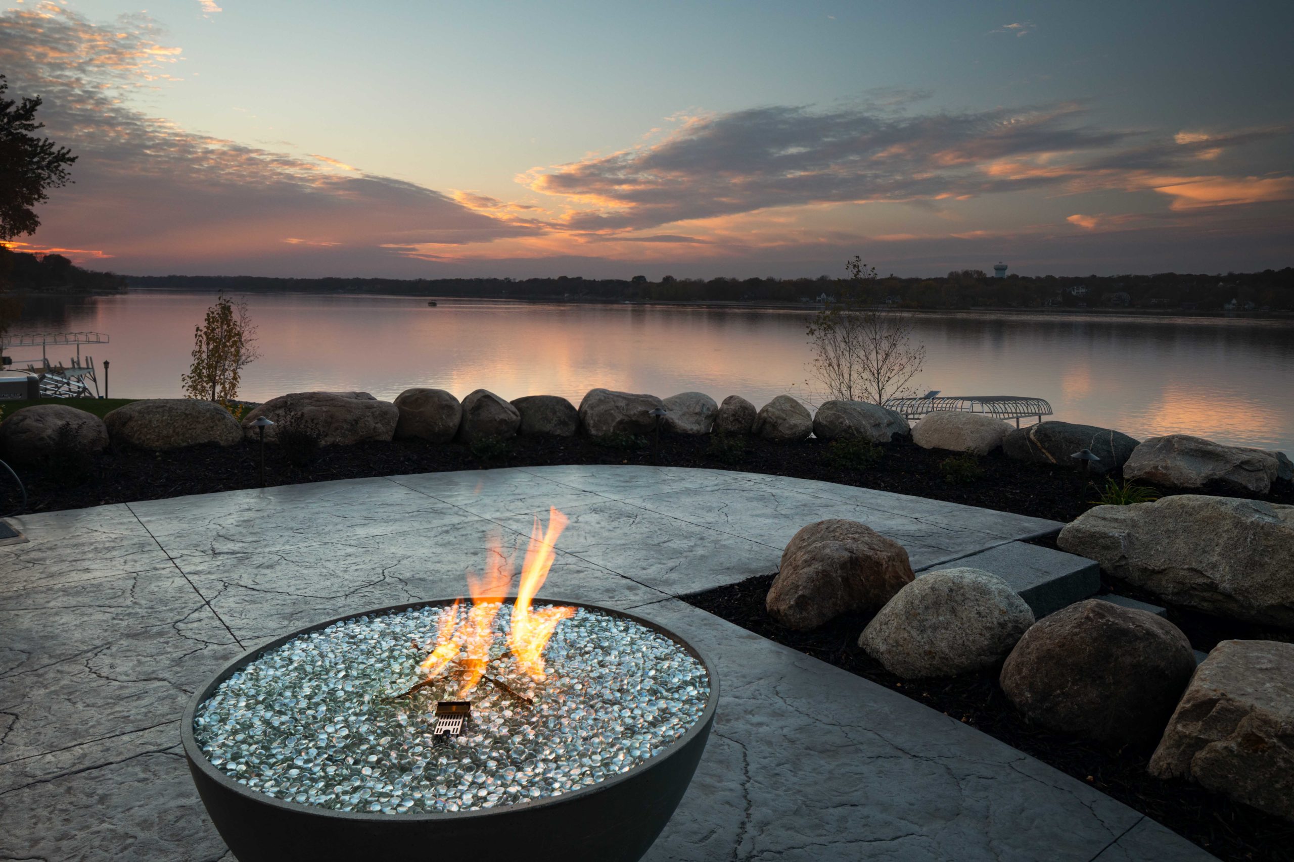 A fire pit in the middle of a lake.