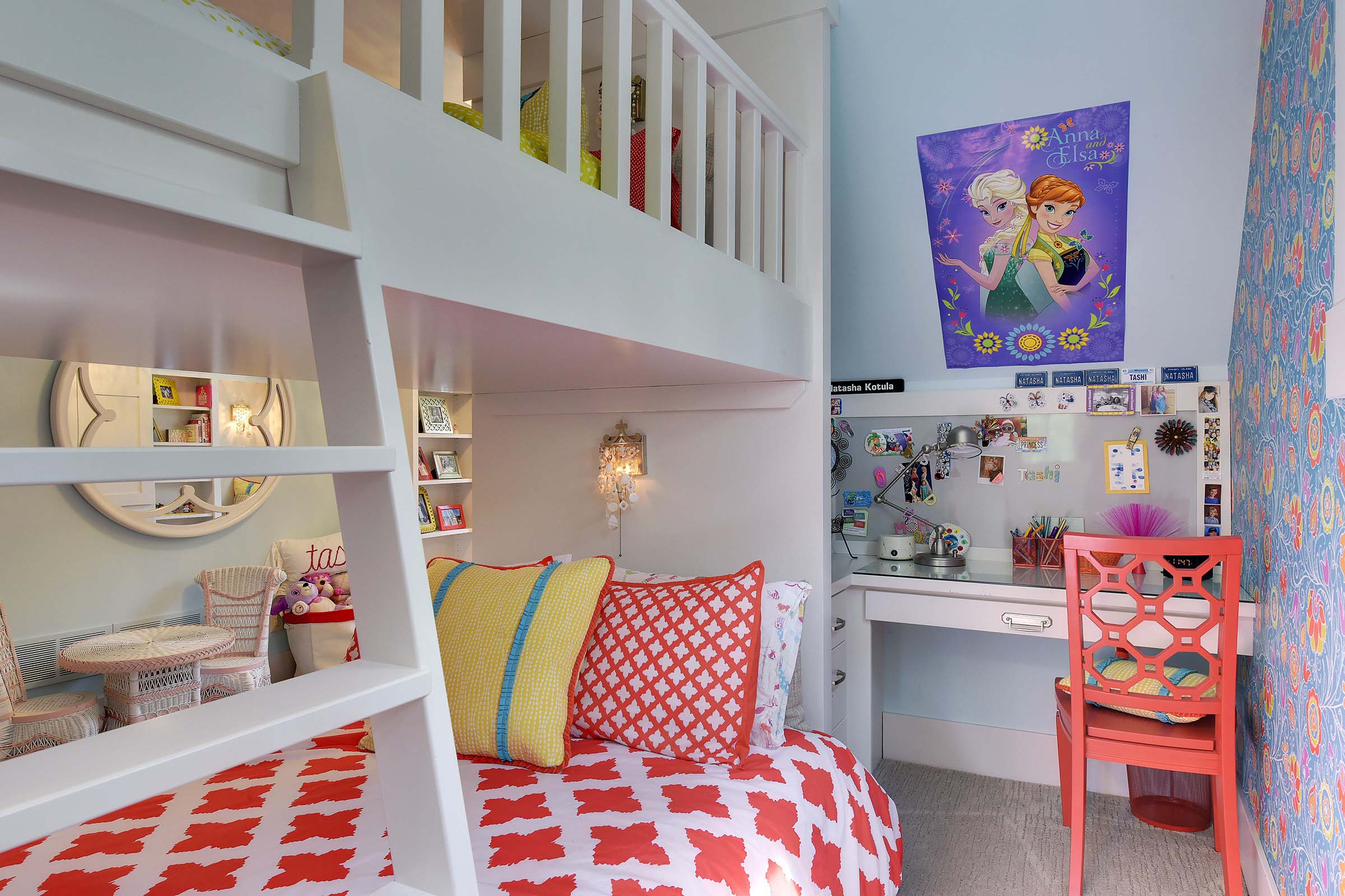 A contemporary girl's bedroom with a bunk bed and a desk.