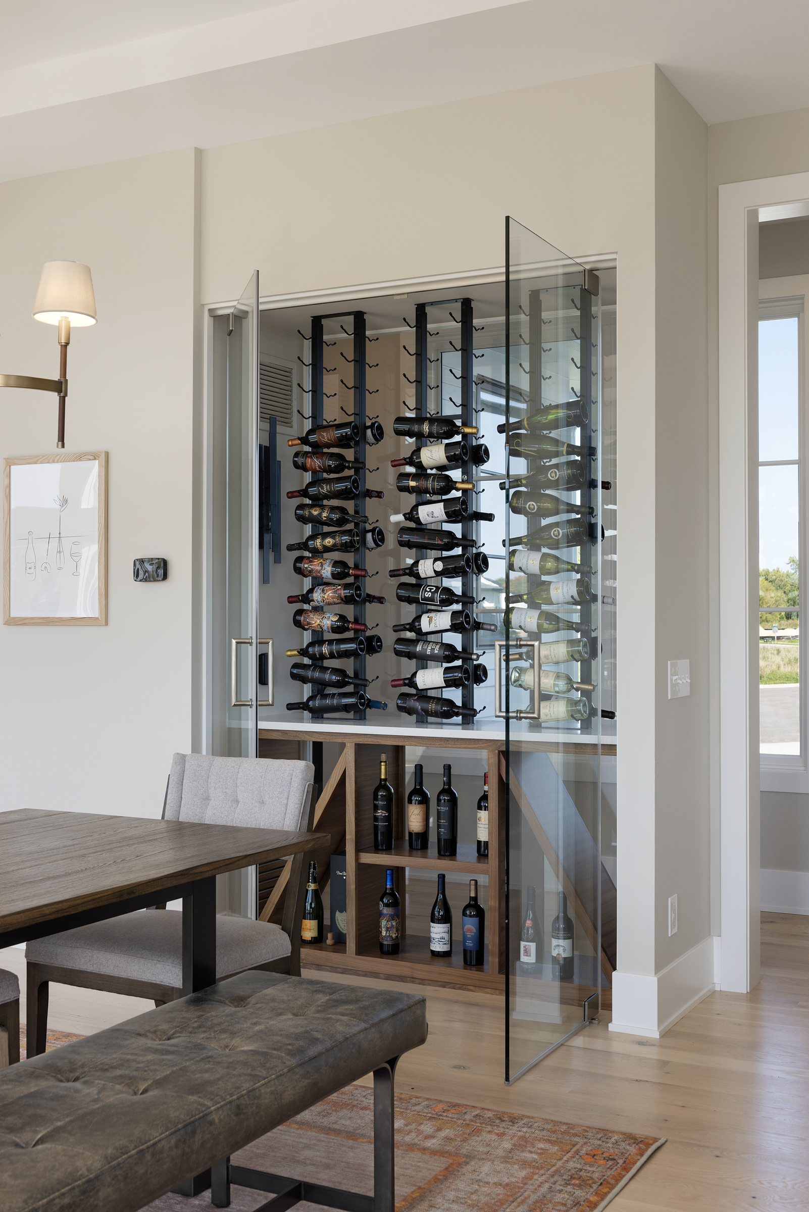A prairie-style wine rack in a transitional dining room of a custom home.