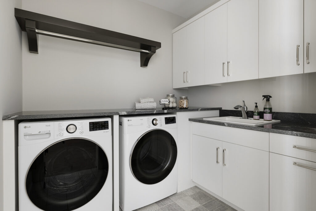 A laundry room with a washer and dryer.