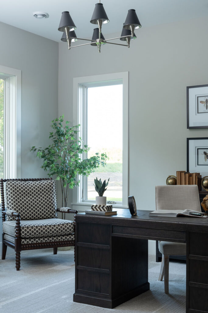 A Transitional home office with a desk and chair.